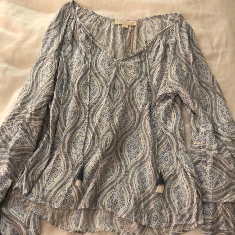 Super cute and flattering blouse!!